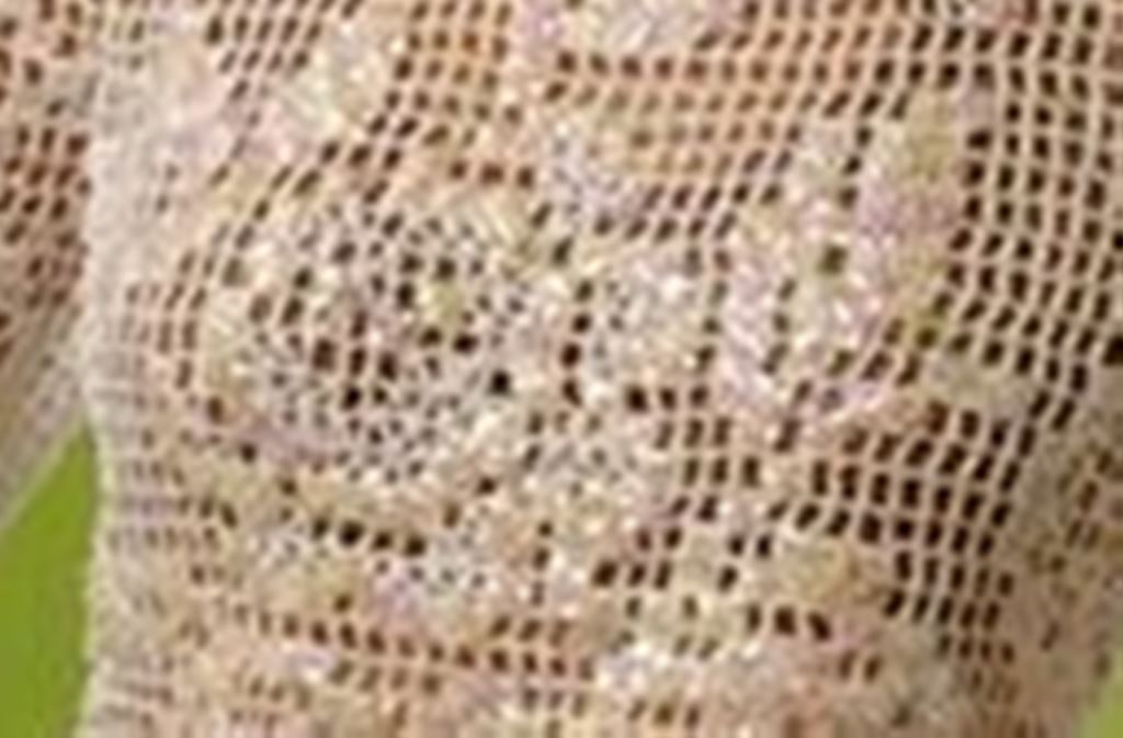 Un pull façon filet au crochet