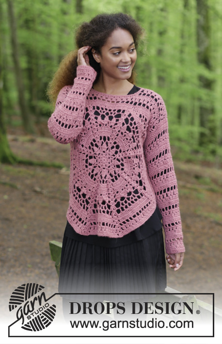 Au crochet un pull avec un cœur hexagone