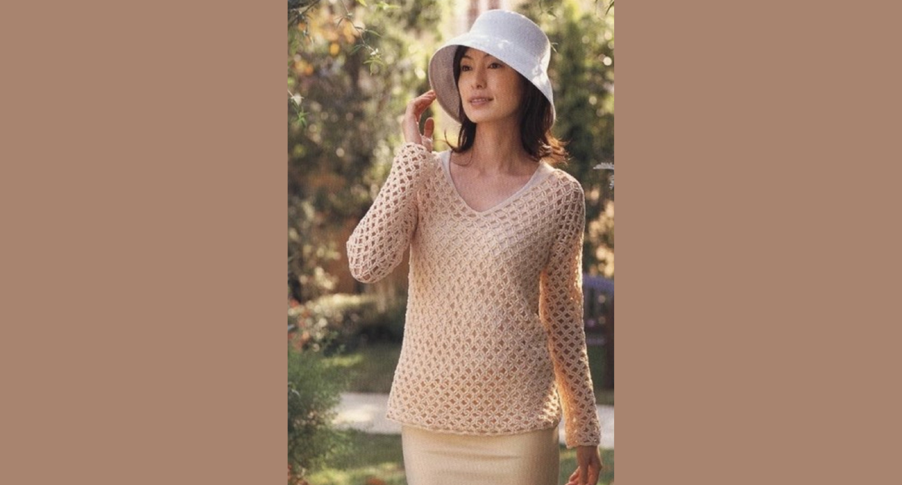 Au crochet un pull ajouré demi saison