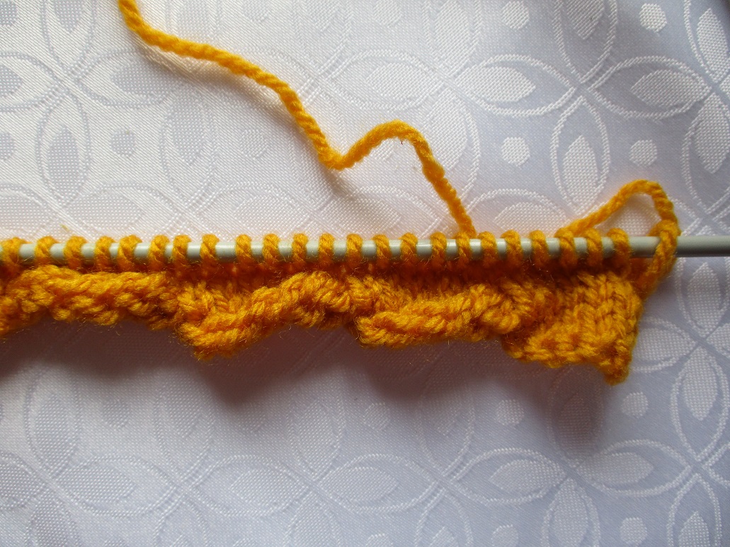 pas à pas de la bordure de torsion au tricot