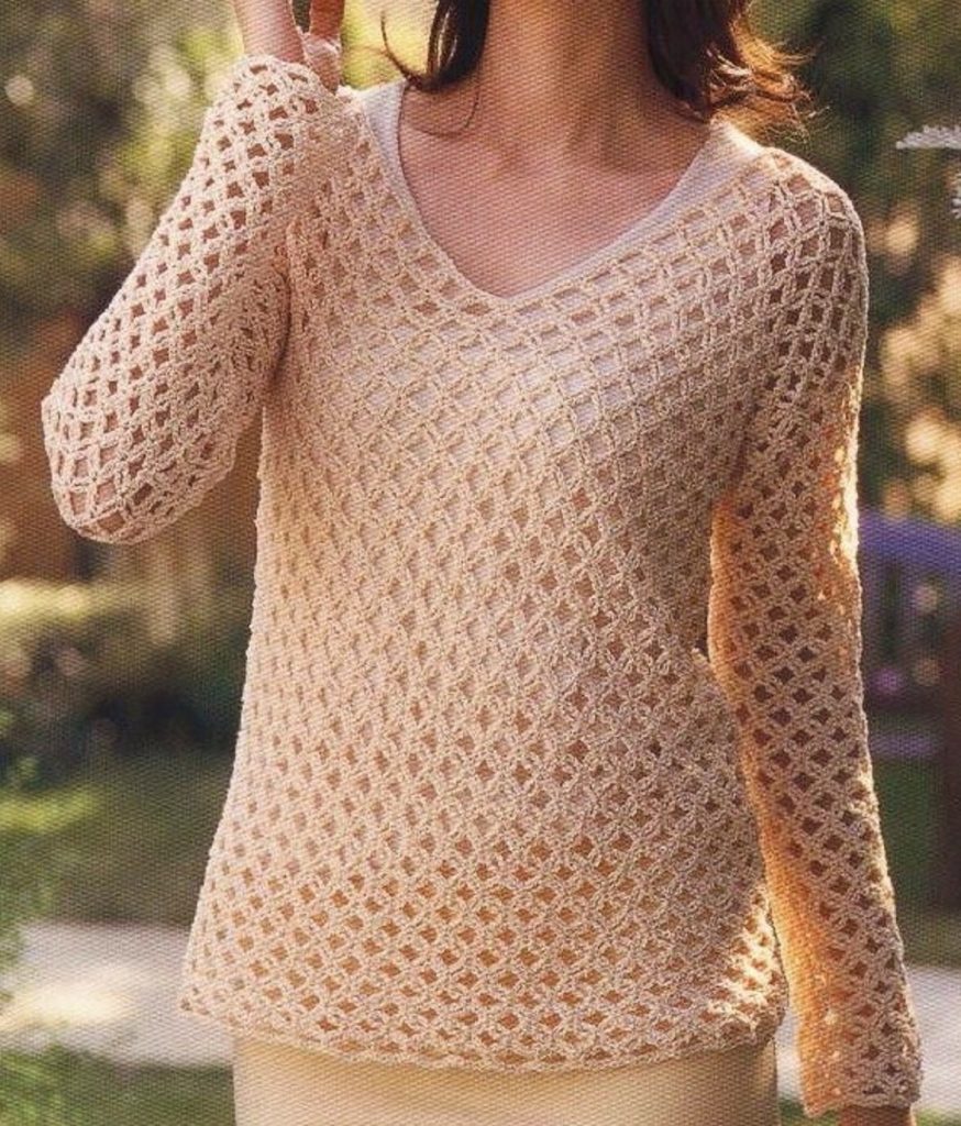 Au crochet un pull ajouré demi saison