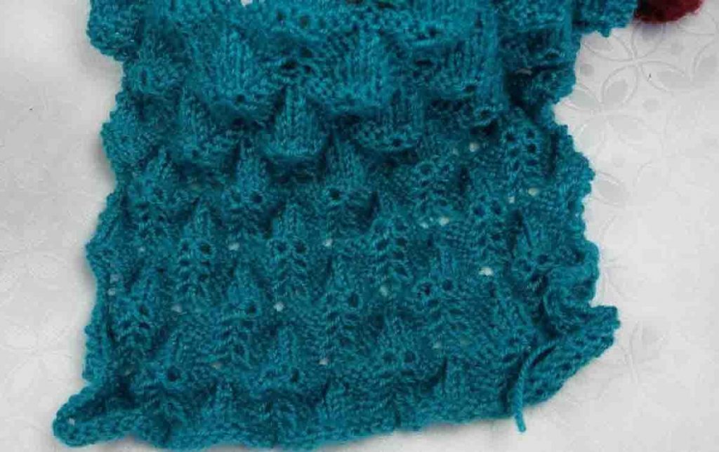 Point plume au tricot facile